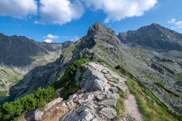 Fototapeta na wymiar Dangerous Trail on the Ridge of mountains
