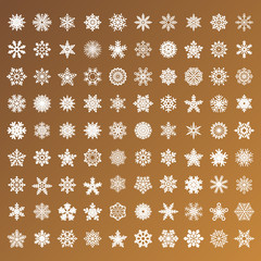 collection of golden vector snowflakes on white background