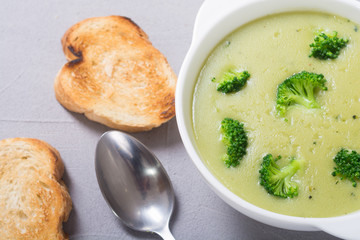 Fresh broccoli cream soup in bowl