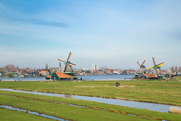 Fototapeta premium Landscape of well-preserved historic windmills and houses