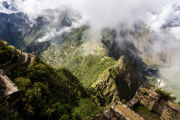 Machu Picchu maybe one of the most visited places in south america and it deserves it. Steep walls, impressive valleys and mountains surround the old city of the Inca Empire during a foggy morning