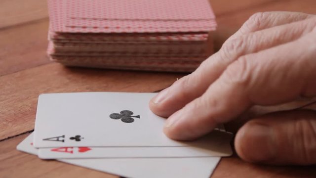 three aces on the table in a card game, close-up