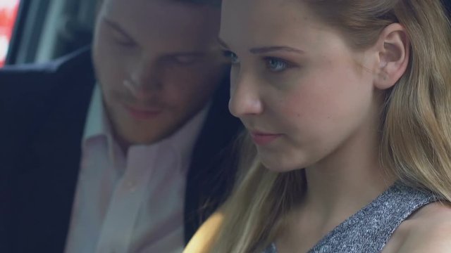 Embarrassed young lady stops man from kissing her in car, secret affair, romance