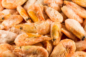 Frozen red shrimps. Shrimp in the ice. Close-up