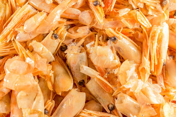 Purification of the eaten shrimp. Remains to emit. Close-up