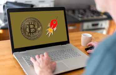 Fototapeta na wymiar Bitcoin growth concept on a laptop