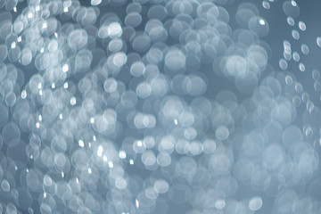 falling snow, abstract blue bokeh background