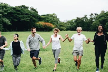 Fotobehang Happy diverse people enjoying in the park © Rawpixel.com