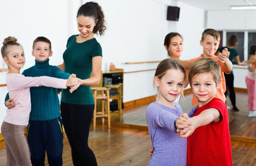 Children studying of partner dance  at dance school