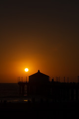 Manhattan beach pier during the beautiful sunset in California