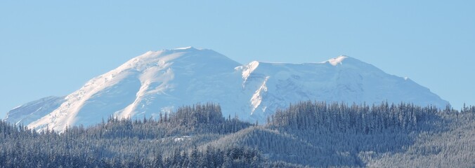 Mt. Rainier Peaks Over a Foothill on it's North 3