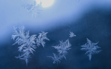 Winter Holidays Season Fantasy World Concept: Macro Image of Natural Ice Crystals Patterns on a...