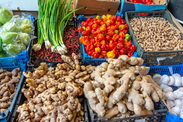 Ginger, pepper, peanuts and garlic for sale at a market in London