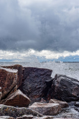 waves crashing on rocks