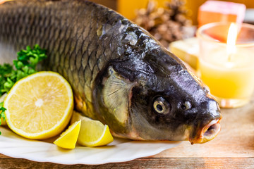 Czech christmas time and customs - bohemian cuisine and typical fish - traditional carp prepared for festive dinner cooking