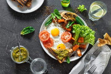 Breakfast table Fried eggs vegetables mushrooms toast Top view Healthy