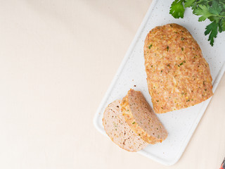 Terrine, meat loaf. Baked Turkey ground meat. Traditional French and American dish. Top view, copy space.