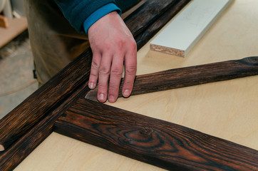carpentry parts in the workshop, cutting corners for the manufacture of the product