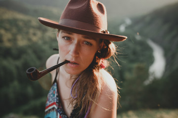 Female portrait beautiful boho style. Woman in outdoors