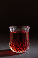 Crystal glass on the table. Image of glassware in a low key.