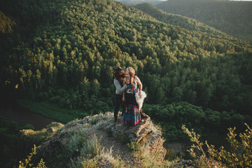 Obraz premium Sensual hipster couple in boho clothes in nature. Summer photo