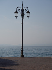 Isolated street light on a sidewalk