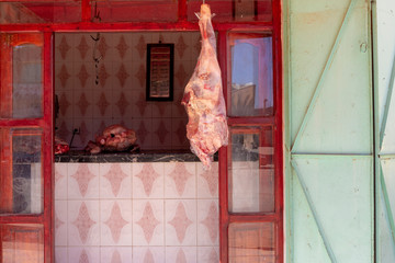 Meat hanging outside a butchers shop in the Merzouga, morocco