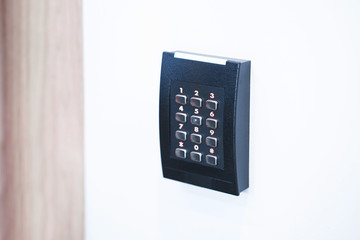 Door access control keypad with keycard reader.