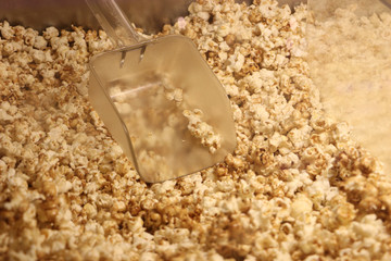 Popcorn texture.Salted popcorn in plastic box ready for sell