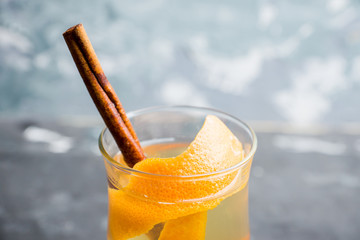 Mulled white wine on the rustic background. Selective focus. Shallow depth of field.