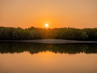 Fototapeta na wymiar Beautiful sunset at lakeside