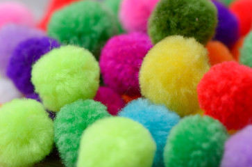 A colorful  Pom Pom with white background