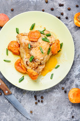 Chicken meat in apricot sauce