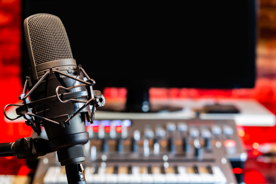 microphone on digital recording equipment in studio background