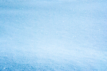 Fototapeta na wymiar Sunny snow background, frost texture. Winter season background or texture.