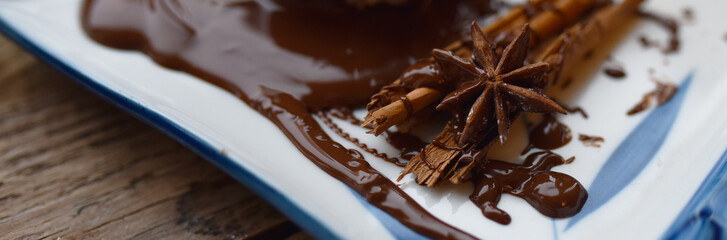 chocolate cinnamon star anise on white background
