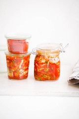 Fototapeta na wymiar Kimchi salad in glass jars. 