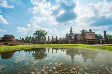 Fototapeta na wymiar Wat Mahathat Temple in Sukhothai historical park, Thailand