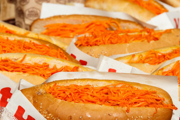 Fresh hot dogs with korean carrot. Fast food, street food