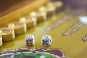 Dices set.Play backgammon table game.Rolling dice in old board game