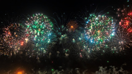 Obraz na płótnie Canvas New Year celebration colorful fireworks. New year and holidays concept.