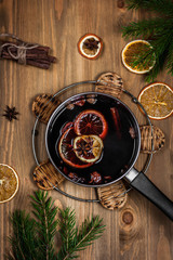 Mulled wine hot drink with citrus and spices