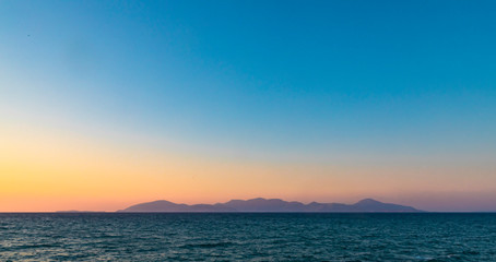 Obraz premium Greek Island Silhouette At Sunset