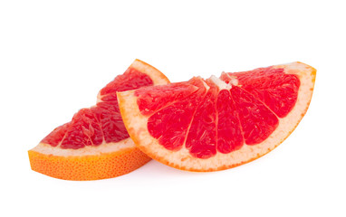 Grapefruit slice isolated on white background.