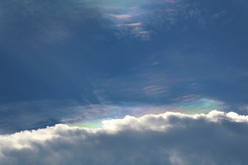 Soft focus of beautiful Pileus cloud or rainbow clouds and ray of sunlight in the evening. Nature background concept.