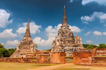 Fototapeta premium Old Chedi at the ruins Wat Phra Si Sanphet Temple, Thailand, Ayutthaya.