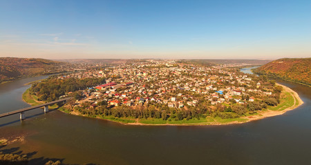 Scenic panorama of Zalishchyky town and the Dniester River. View from viewpoint in Khreshchatyk village, Ternopil region, Ukraine