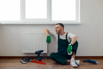 Handyman is resting after work