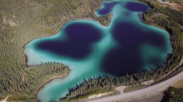 Aerial Backward Rise: Tree Filled Emerald Lake 