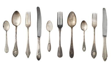 Vintage spoons, forks and knives isolated on a white background. Retro silverware.